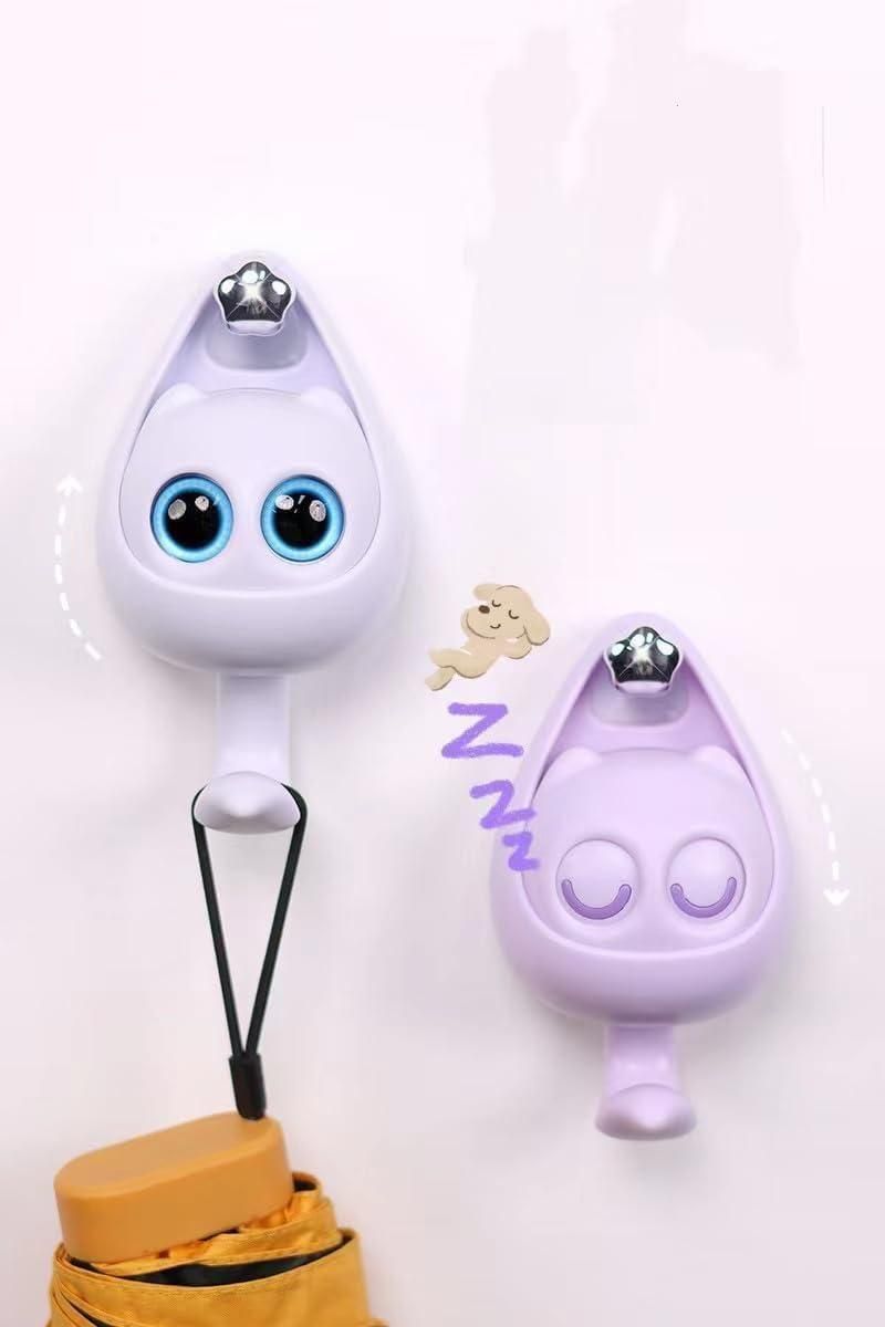 Pair of lavender teardrop wall hooks with cartoon open and closed eyes holding an umbrella strap cute wall key hooks